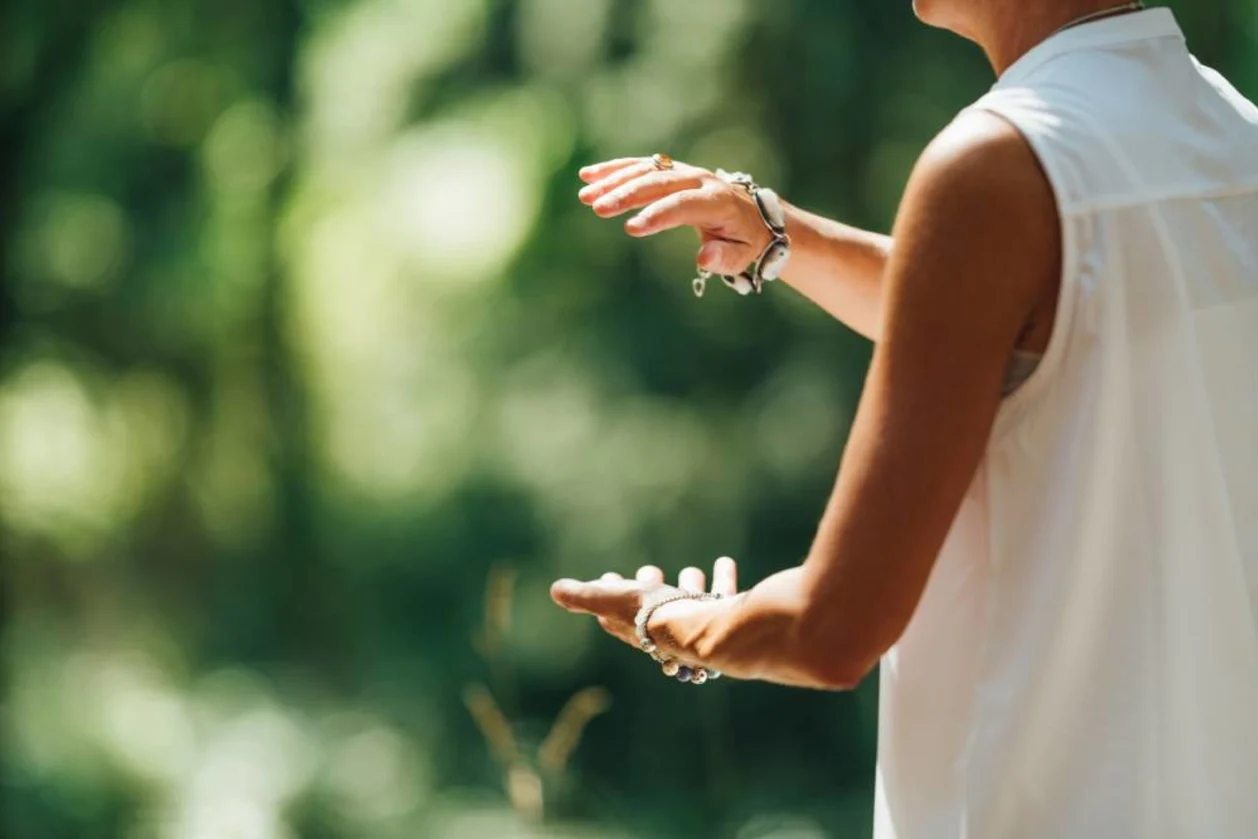 woman practicing tai-chi in nature